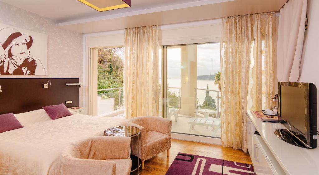 Двухместный (Двухместный номер с 1 кроватью или 2 отдельными кроватями и видом на море) отеля Meridian Hotel, Будва