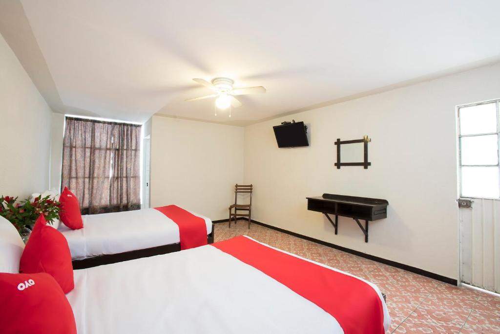 Двухместный (Стандартный двухместный номер) отеля Hotel El Angel, Леон (Штат Гуанахуато)