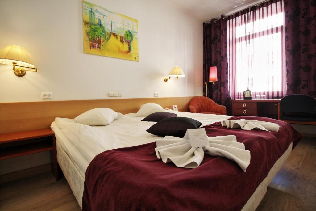 Двухместный (Двухместный номер с 1 кроватью или 2 отдельными кроватями) отеля A1 Hotel, Рига