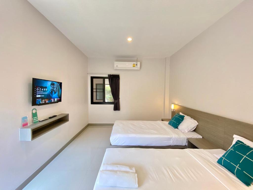 Двухместный (Просторный двухместный номер с 2 отдельными кроватями) гостевого дома Pensiri House, Пхукет