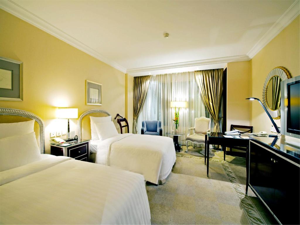Двухместный (Двухместный номер Делюкс с 2 отдельными кроватями) отеля The Kunlun Beijing, Пекин