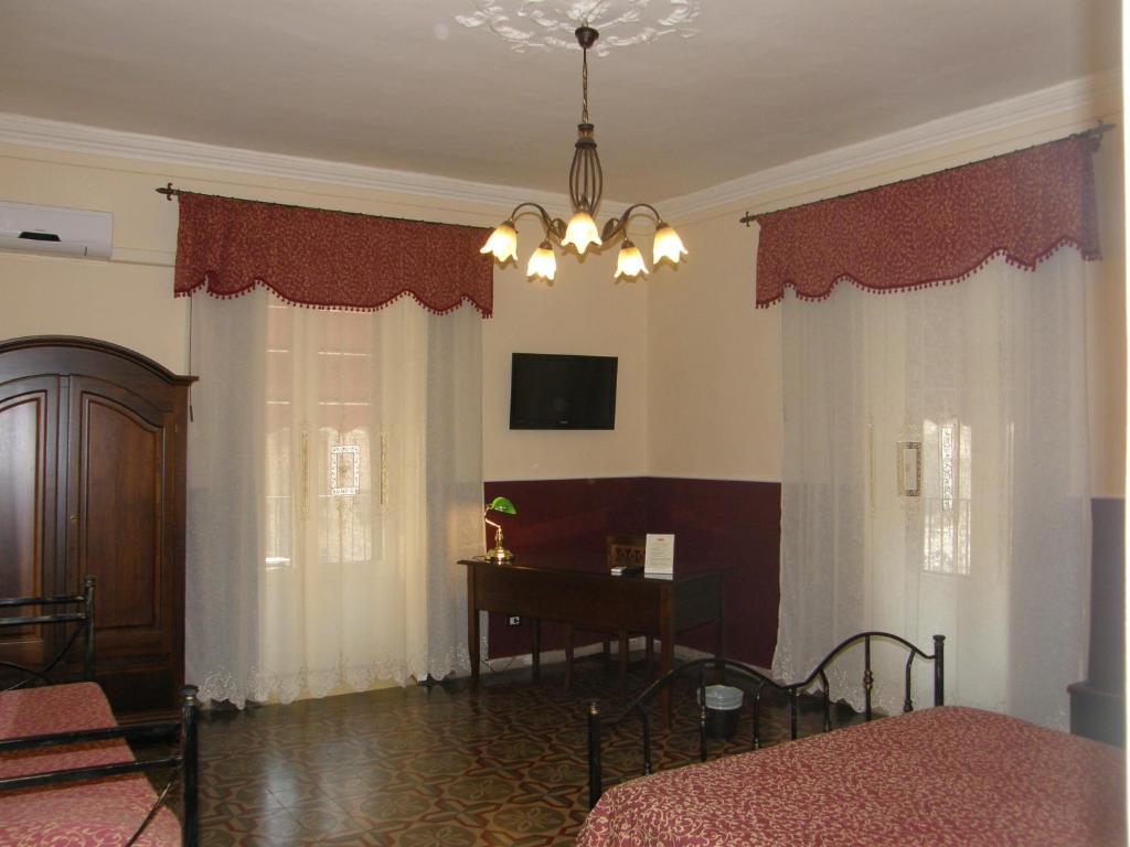 Двухместный (Улучшенный двухместный номер с 1 кроватью) гостевого дома Il Gattopardo House, Катания