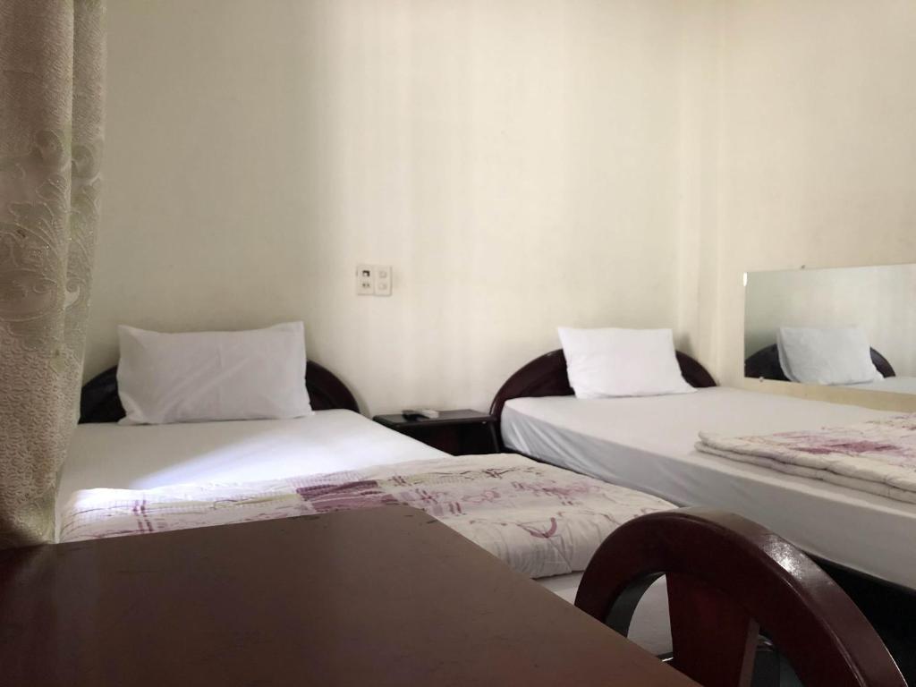 Трехместный (Трехместный номер Делюкс) отеля OYO 1116 Huy Vu Motel, Нячанг