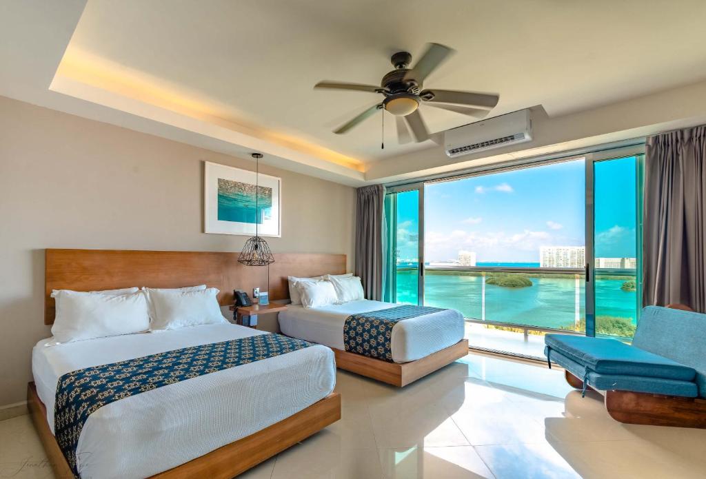 Двухместный (Стандартный номер с видом на лагуну - 2 двуспальные кровати) отеля Ocean Dream BPR, Канкун