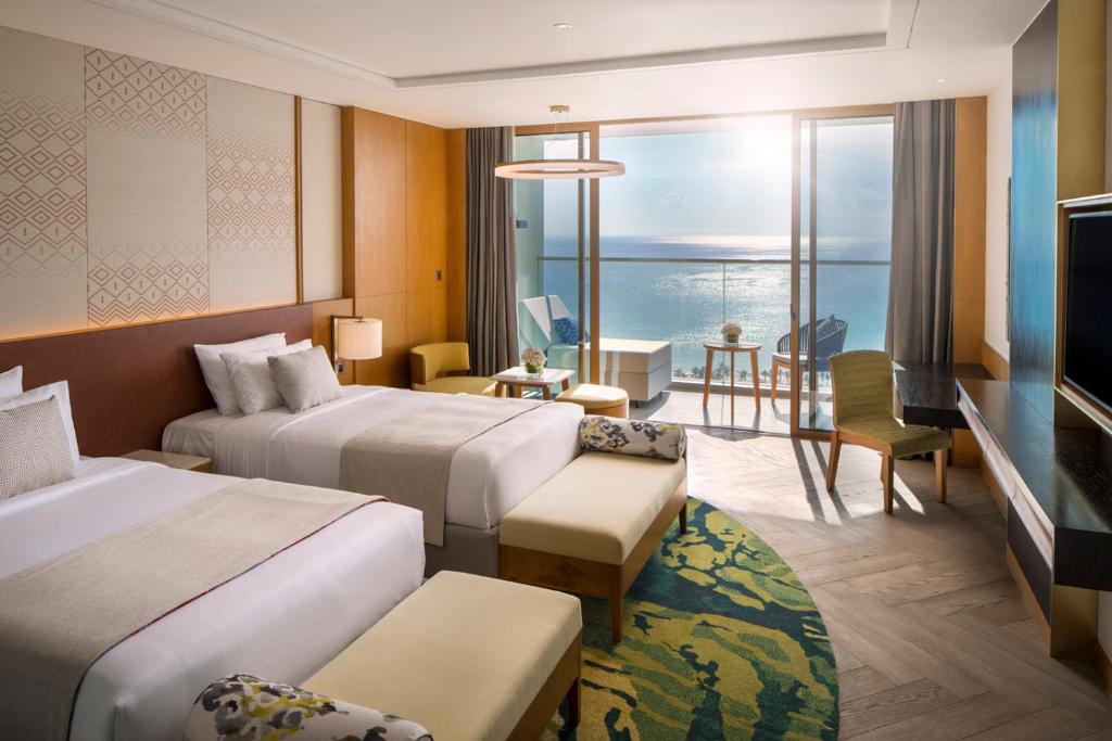 Двухместный (Улучшенный двухместный номер с 2 отдельными кроватями и видом на море) курортного отеля Mövenpick Resort Cam Ranh, Камрань