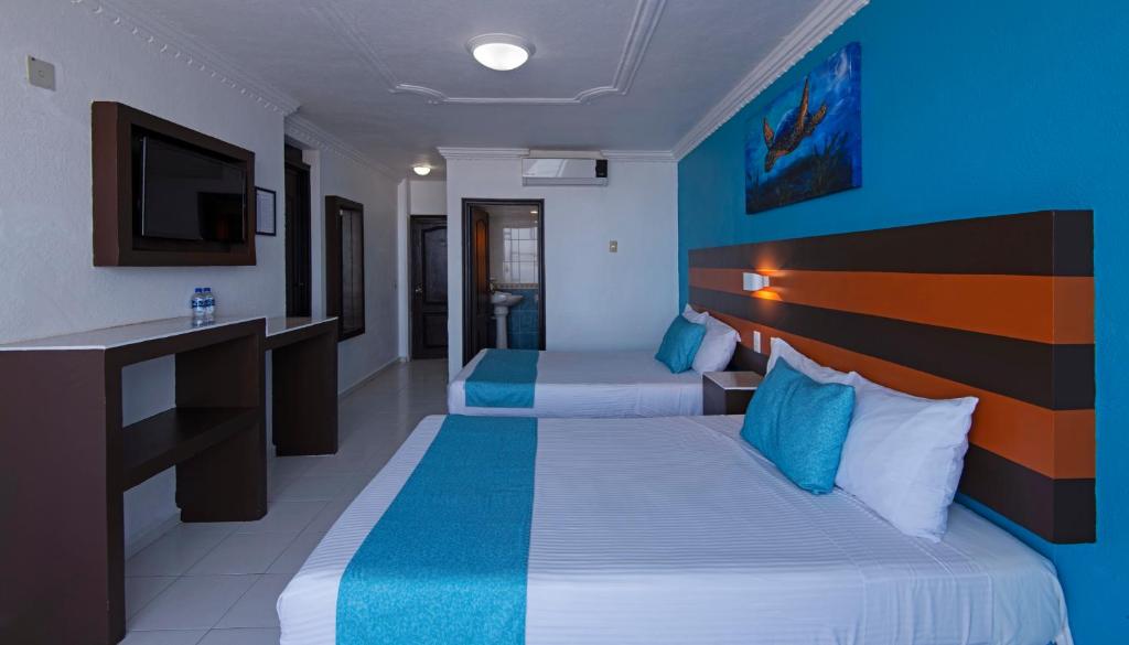 Двухместный (Двухместный номер с 1 кроватью или 2 отдельными кроватями) отеля Hotel Fiesta Mexicana, Мансанильо