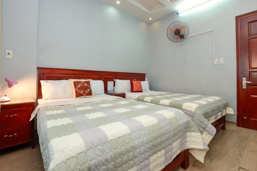 Двухместный (Стандартный двухместный номер с 2 отдельными кроватями) отеля OYO 1065 Song Long Hotel, Ханой