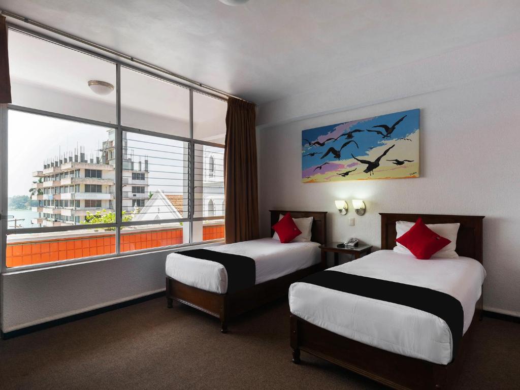 Двухместный (Стандартный двухместный номер с 2 отдельными кроватями) отеля Hotel Florida de Tuxpan, Туспам-де-Родригес-Кано