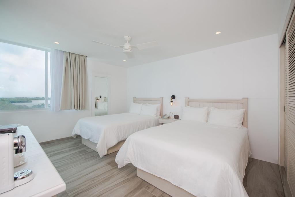 Двухместный (Стандартный двухместный номер с 1 кроватью) курортного отеля Oleo Cancun Playa All Inclusive Boutique Resort, Канкун