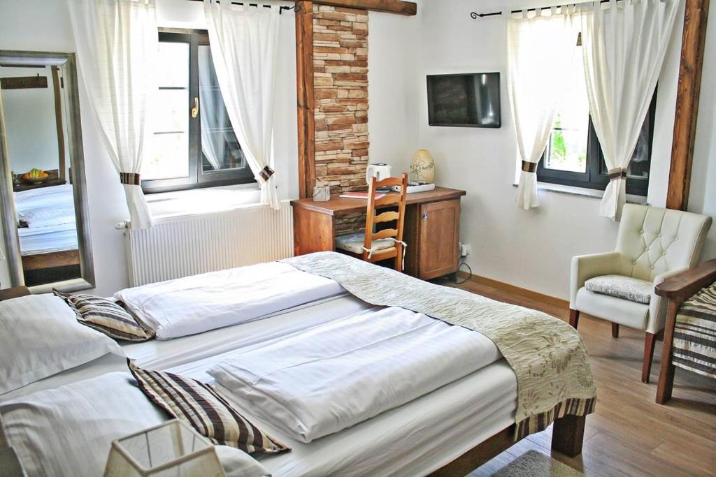 Семейный (Семейный номер с видом на сад) гостевого дома Etno Garden Exclusive Rooms, Плитвица-Село