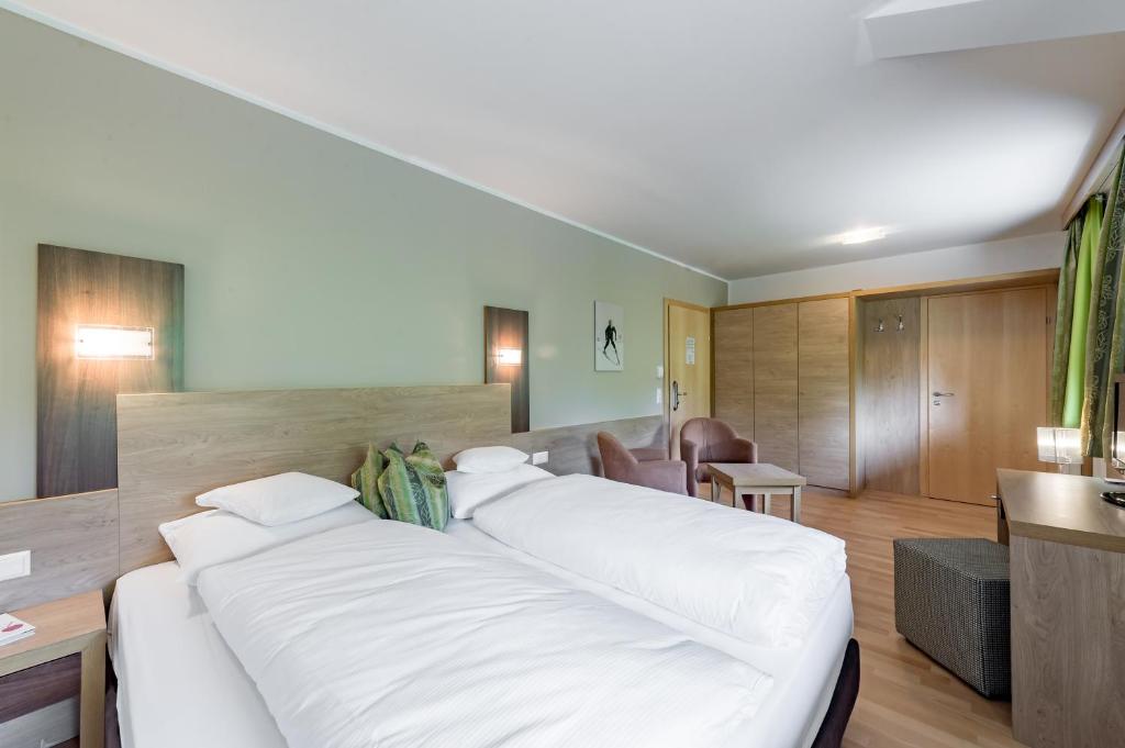 Двухместный (Улучшенный двухместный номер с 1 кроватью) отеля Aktivhotel Zum Gourmet, Зефельд-ин-Тироль