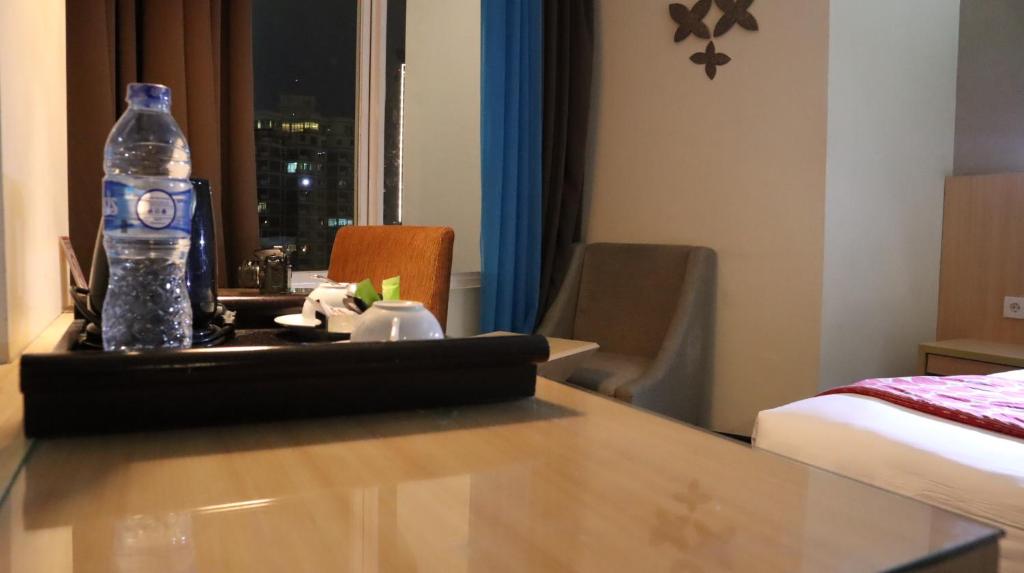 Двухместный (Улучшенный двухместный номер с 2 отдельными кроватями) отеля Cipta Hotel Pancoran, Джакарта