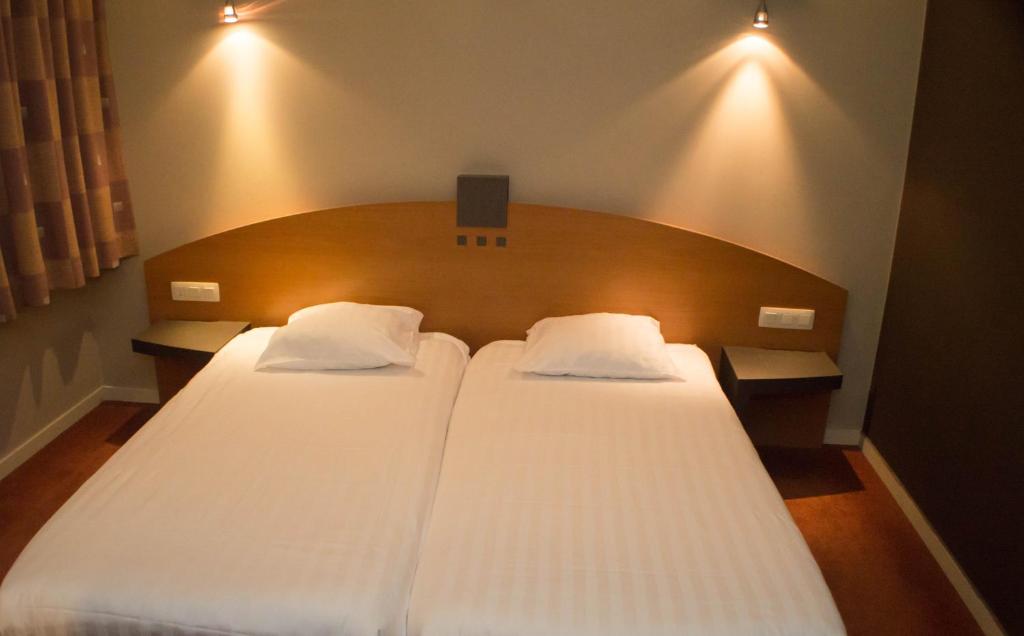 Двухместный (Бюджетный двухместный номер с 2 отдельными кроватями) отеля Value Stay Brussels South, Брюссель