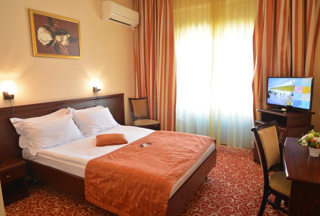 Двухместный (Стандартный двухместный номер с 1 кроватью или 2 отдельными кроватями) отеля Hotel Central, Плоешти