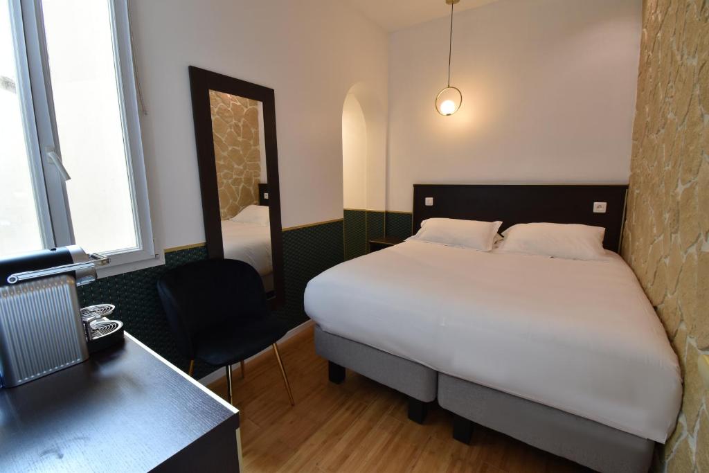Двухместный (Небольшой двухместный номер с 1 кроватью) отеля Hôtel Bonne Nouvelle, Париж