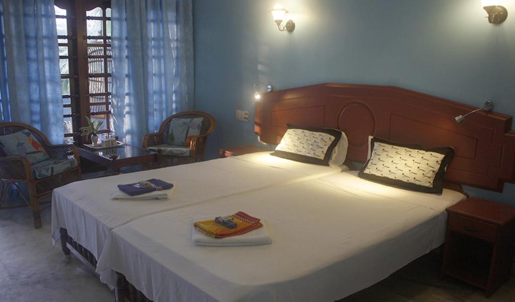 Двухместный (Двухместный номер Делюкс с 1 кроватью или 2 отдельными кроватями, вид на сад) отеля Anitha's Garden Stay, Ковалам