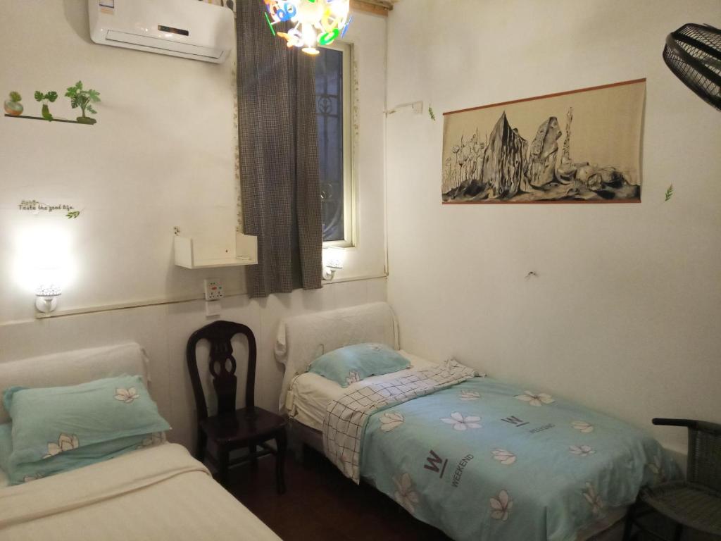 Номер (Односпальная кровать в общем номере для мужчин и женщин) гостевого дома Climbers Inn Yangshuo West Street, Яншо