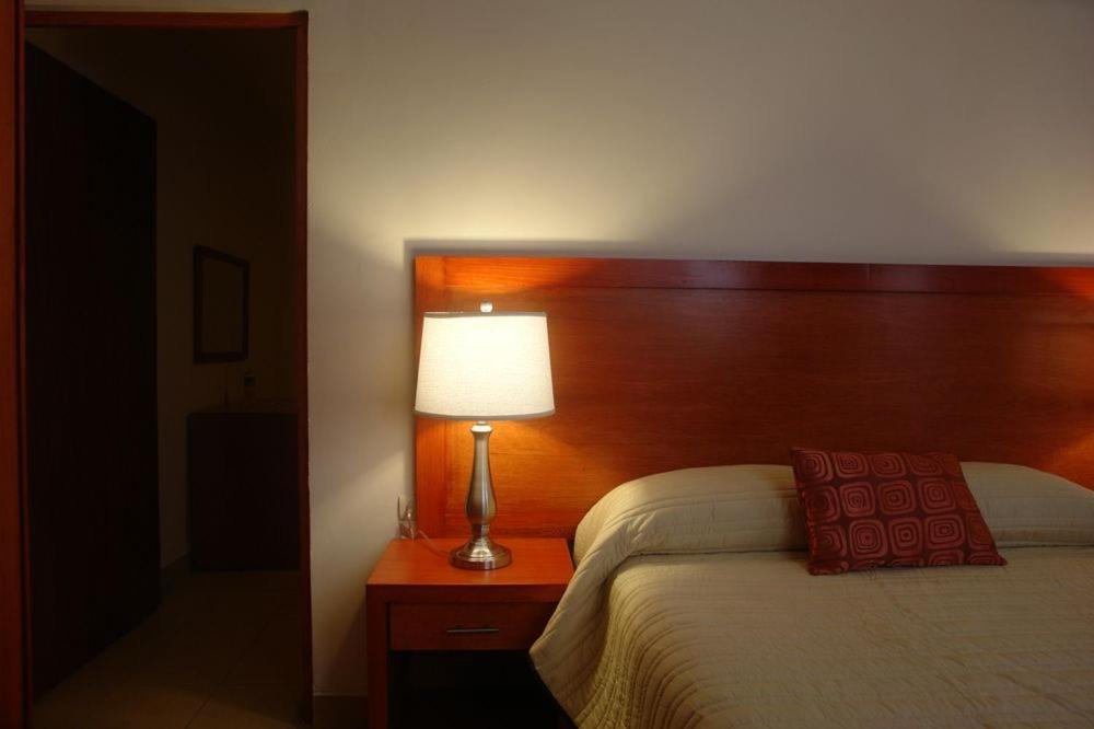 Семейный (Семейный двухместный номер с 1 кроватью) отеля Hotel Marllou, Халапа