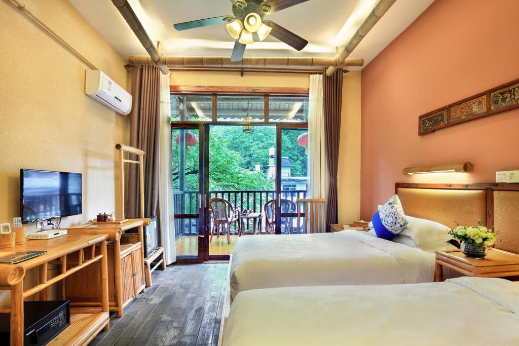 Двухместный (Двухместный номер с 2 отдельными кроватями) отеля Yangshuo Mountain Nest Boutique Hotel, Яншо