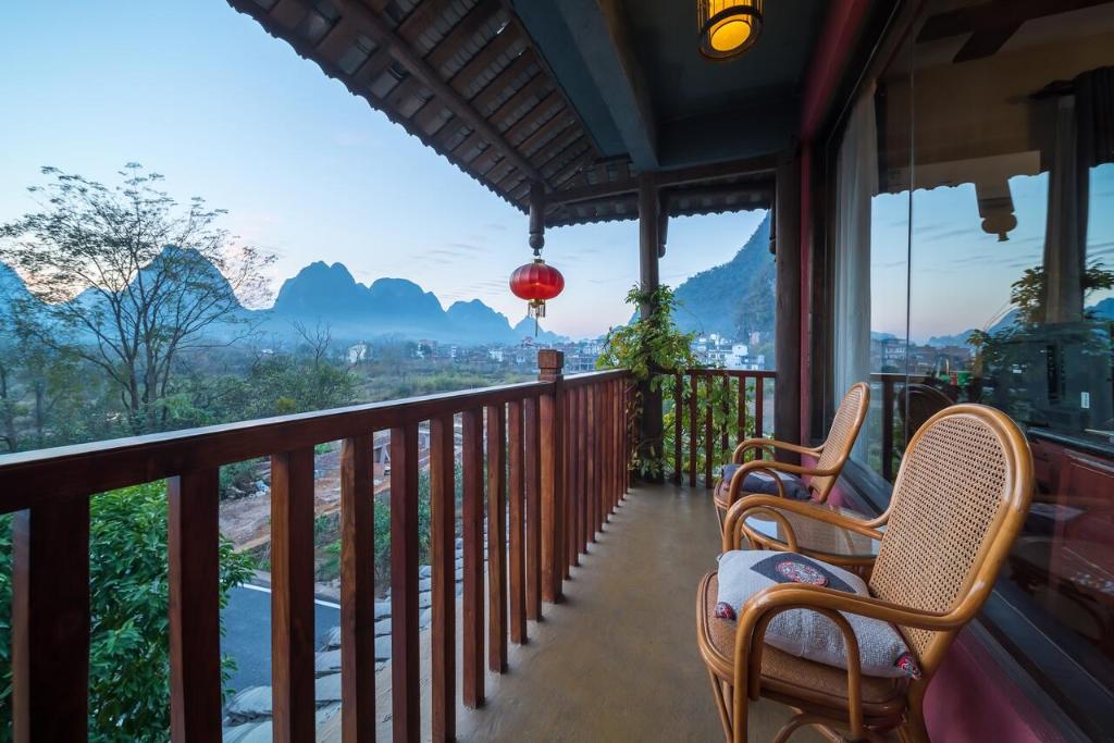 Сьюит (Улучшенный люкс с кроватью размера «king-size»), Yangshuo Mountain Nest Boutique Hotel