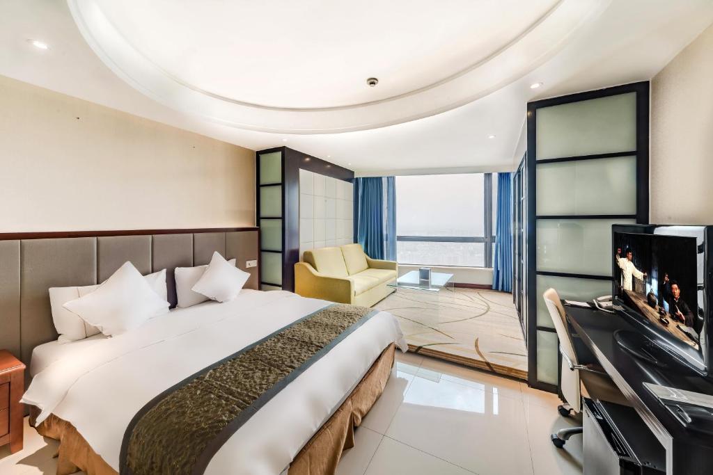 Двухместный (Улучшенный двухместный номер с 1 кроватью) отеля Ming Guang International Grand Hotel Haikou, Хайкоу