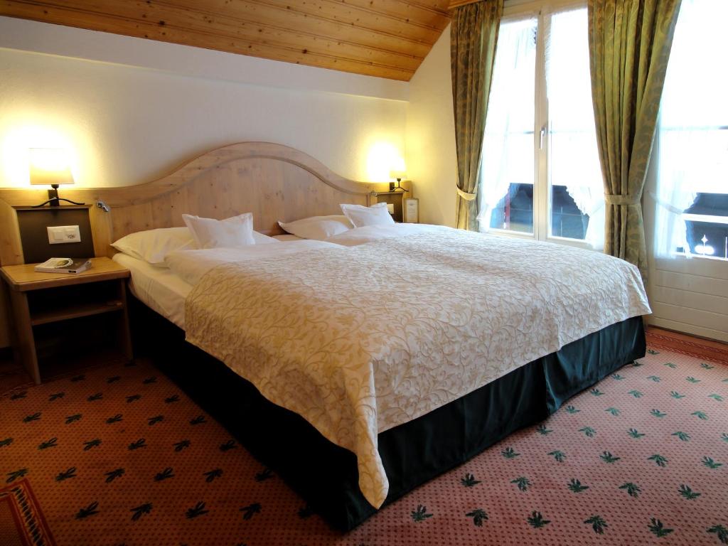 Двухместный (Стандартный двухместный номер с 1 кроватью) отеля Romantik Hotel Schweizerhof, Гриндельвальд