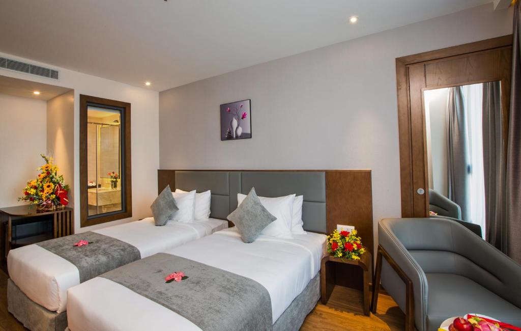 Двухместный (Двухместный номер Делюкс с 1 кроватью или 2 отдельными кроватями и видом на море) отеля DTX Hotel Nha Trang, Нячанг