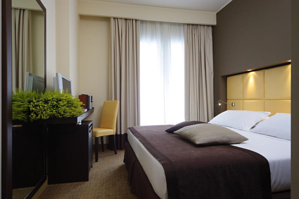 Двухместный (Двухместный номер Делюкс с 1 кроватью или 2 отдельными кроватями) отеля Hotel Aqua, Абано-Терме