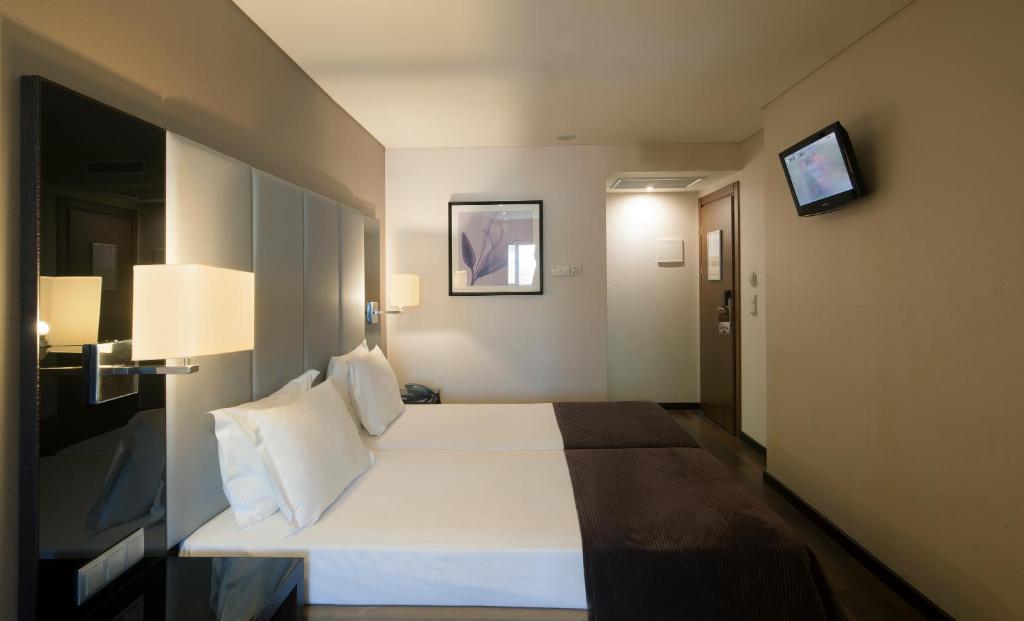 Двухместный (Стандартный двухместный номер с 2 отдельными кроватями) отеля Luxe Hotel By TURIM Hotels, Лиссабон