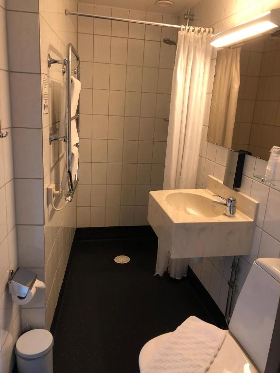 Двухместный (Бюджетный двухместный номер с 2 отдельными кроватями) отеля Grand Hotel Falkenberg, Фалькенберг