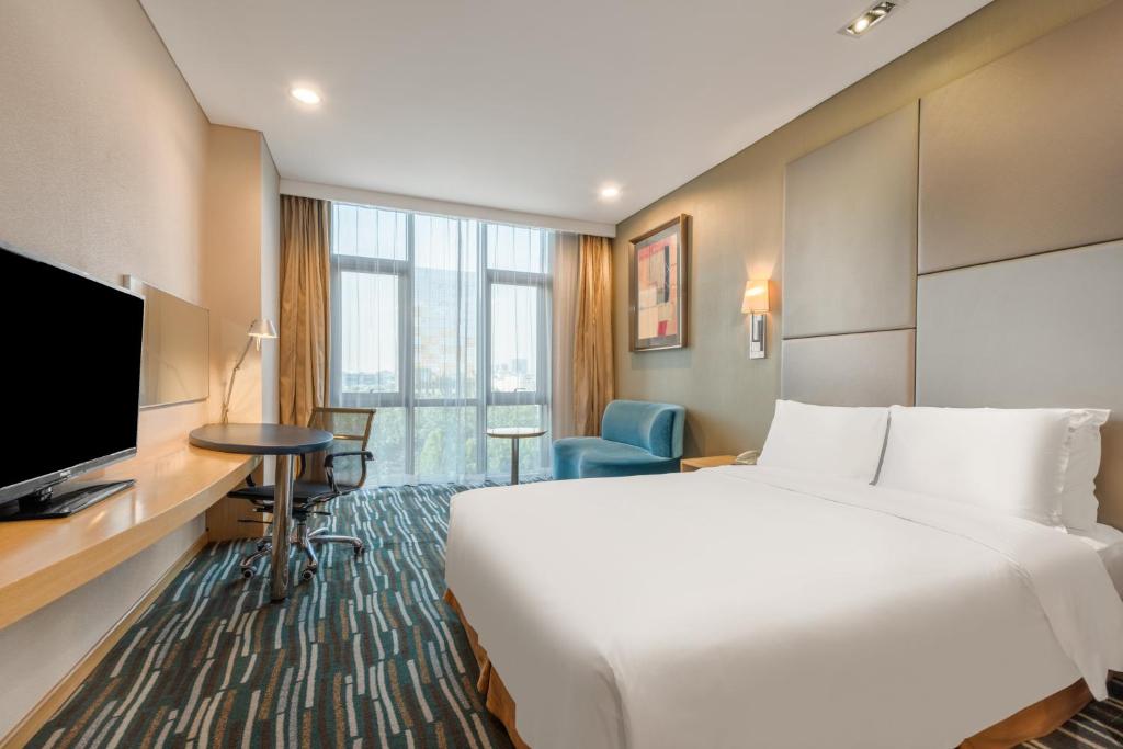 Двухместный (Стандартный двухместный номер с 1 кроватью или 2 отдельными кроватями) отеля Holiday Inn Express Beijing Yizhuang, Дасин