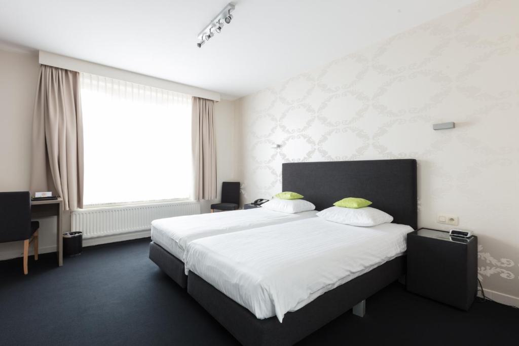 Двухместный (Стандартный двухместный номер с 2 отдельными кроватями) отеля Hotel Essenza, Антверпен