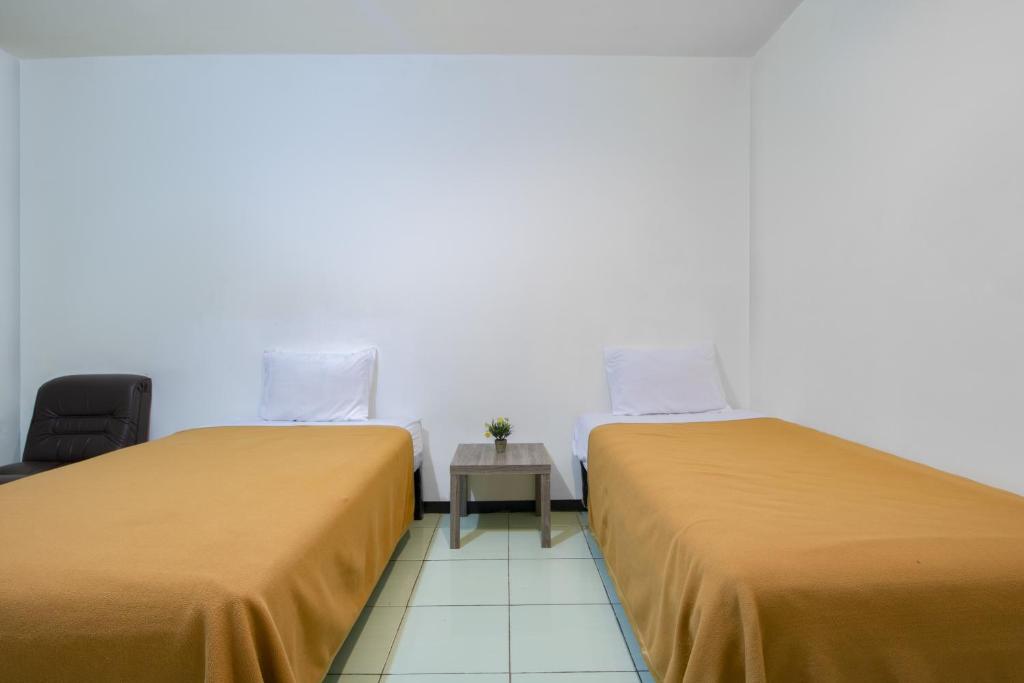 Двухместный (Двухместный номер Делюкс с 2 отдельными кроватями) отеля ZEN Rooms Oriental Residence, Джакарта