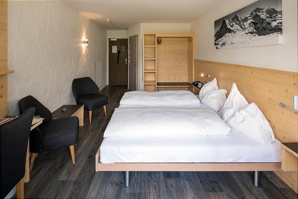 Двухместный (Двухместный номер с 1 кроватью и балконом, верхний этаж) отеля Jungfrau Lodge, Annex Crystal, Гриндельвальд
