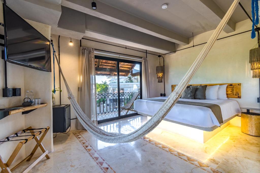 Сьюит (Суперлюкс с гидромассажной ванной) отеля Koox Caribbean Paradise Hotel, Плая-дель-Кармен
