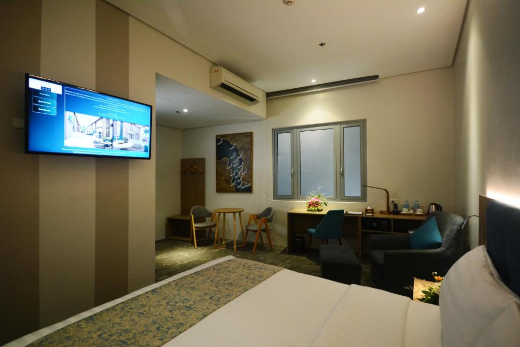 Двухместный (Номер Делюкс с кроватью размера «queen-size») отеля Blue Lotus Hotel, Давао