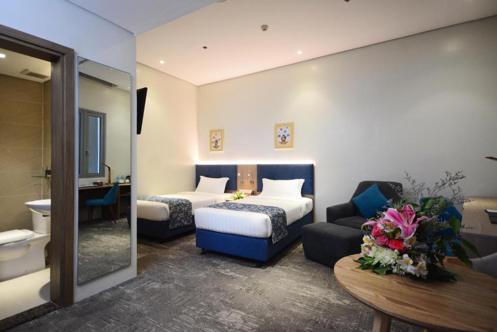 Двухместный (Двухместный номер Делюкс с 2 отдельными кроватями) отеля Blue Lotus Hotel, Давао