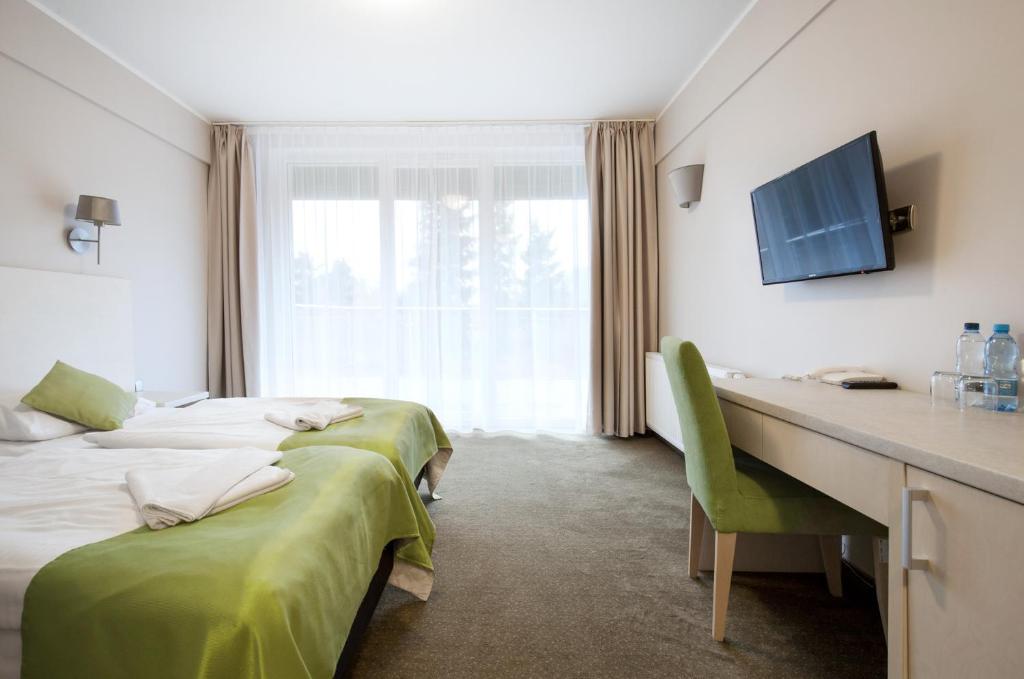 Двухместный (Двухместный номер Делюкс с 1 кроватью и балконом) отеля Hotel Morawa, Строне-Слёнске