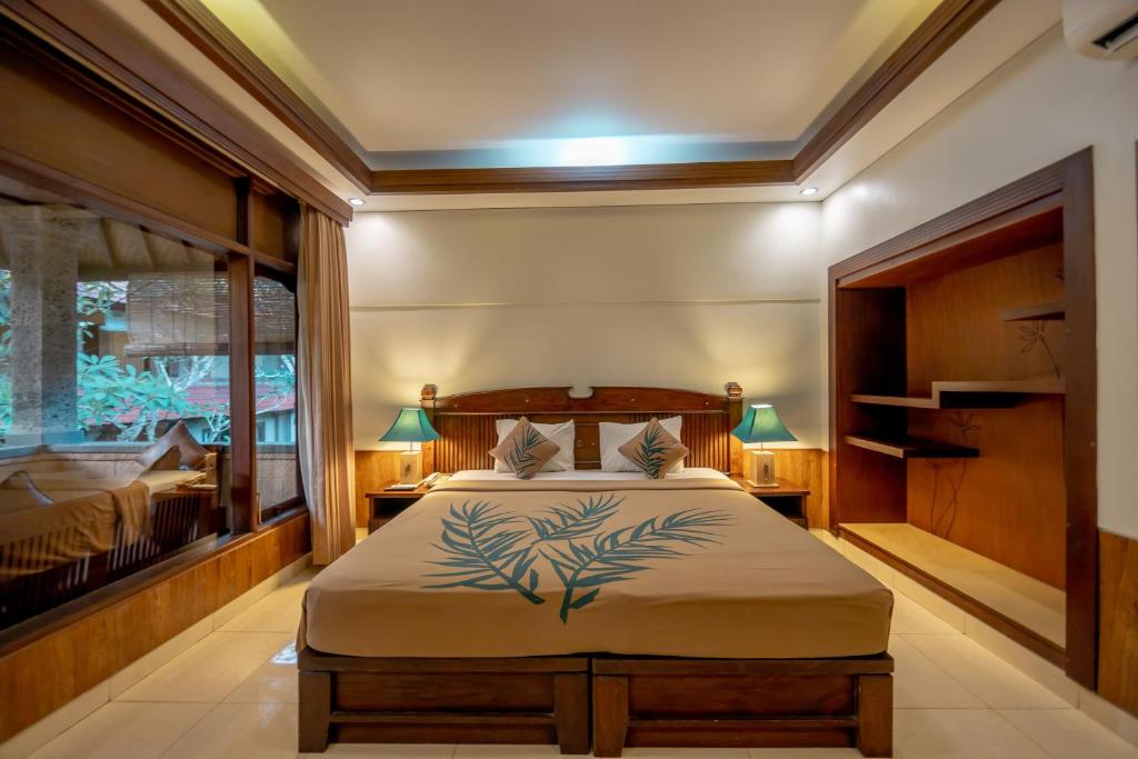 Двухместный (Стандартный двухместный номер с 1 кроватью или 2 отдельными кроватями) курортного отеля De Munut Balinese Resort, Убуд