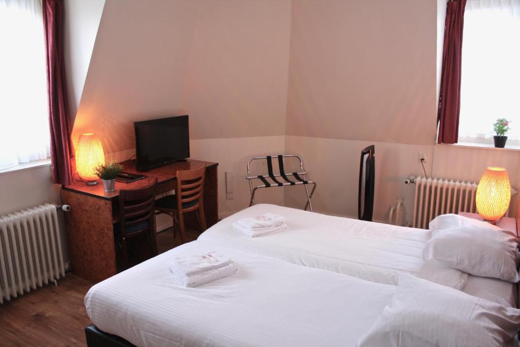 Двухместный (Стандартный двухместный номер с 1 кроватью или 2 отдельными кроватями) отеля Hotel Benno, Эйндховен