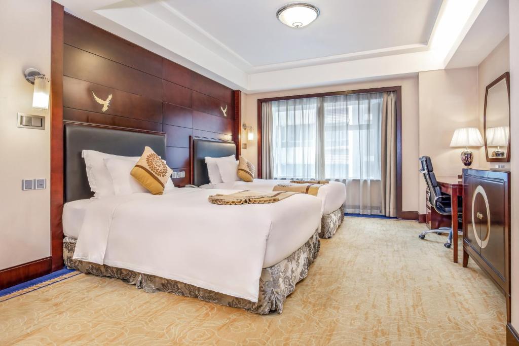 Двухместный (Представительский двухместный номер с 2 отдельными кроватями) отеля Crowne Plaza Changsha City Centre, Чанша
