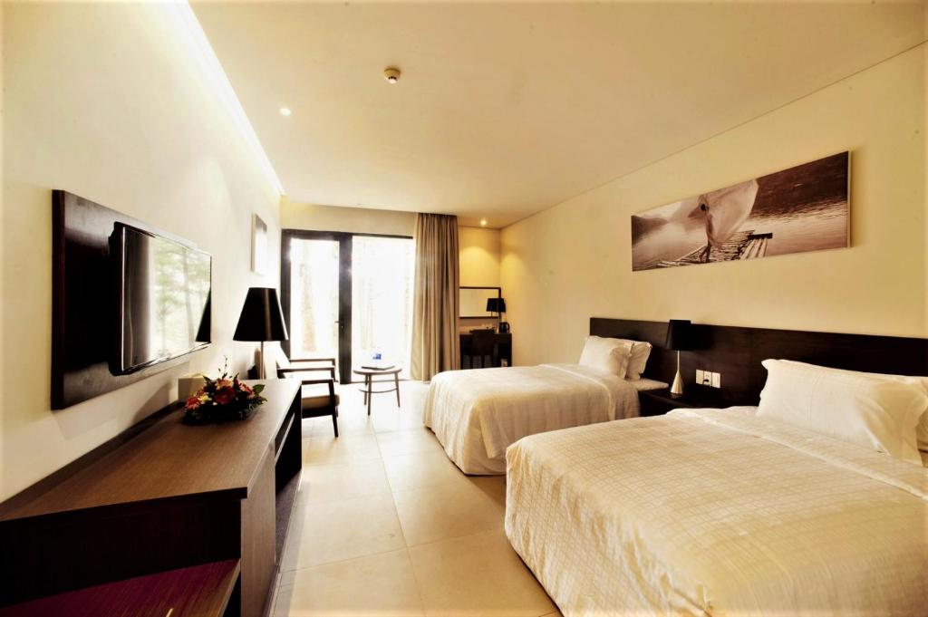 Двухместный (Улучшенный двухместный номер с 2 отдельными кроватями, цокольный этаж) курортного отеля Terracotta Hotel & Resort Dalat, Далат
