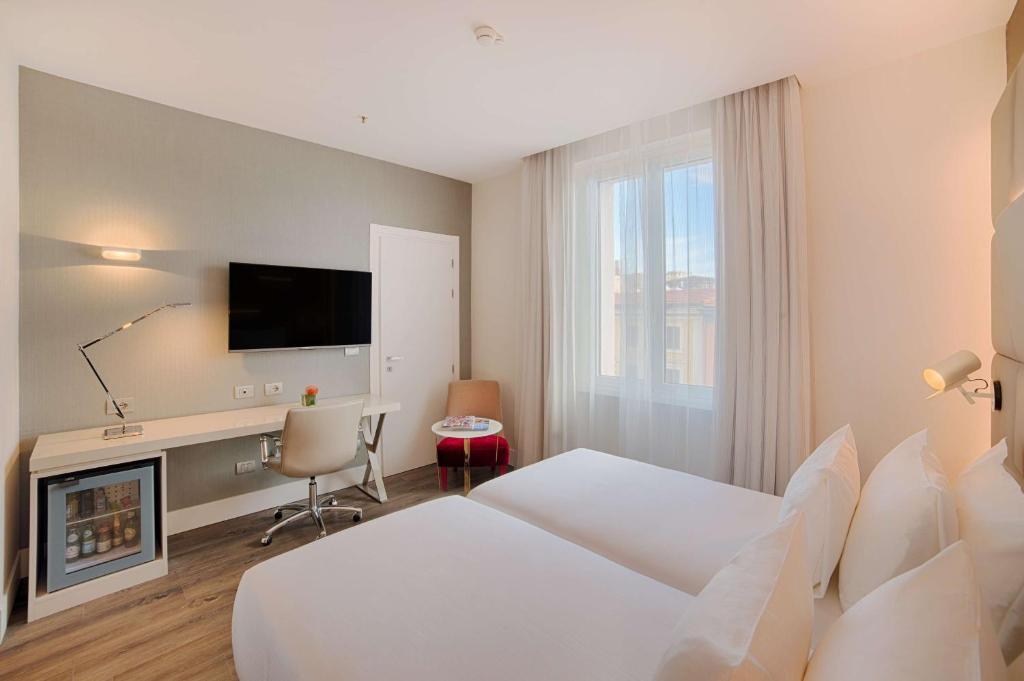 Двухместный (Улучшенный двухместный номер с 1 кроватью или 2 отдельными кроватями) отеля NH Collection Palazzo Cinquecento, Рим