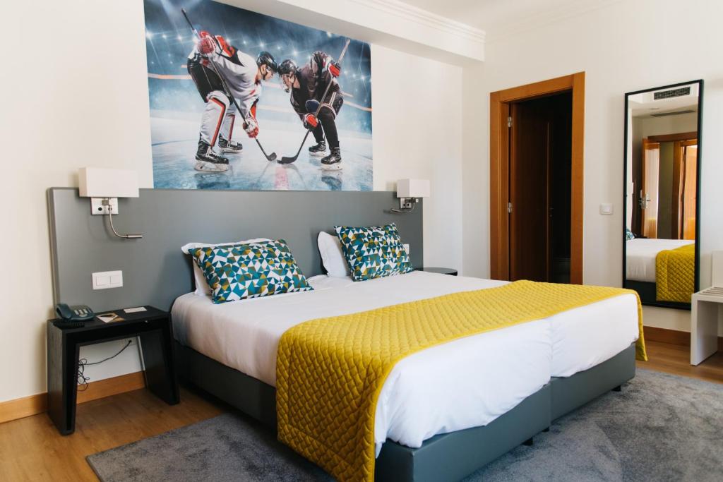 Двухместный (Улучшенный двухместный номер с 2 отдельными кроватями) отеля America Diamonds Hotel, Лиссабон