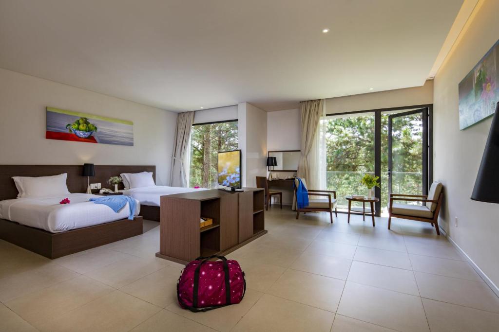 Двухместный (Двухместный номер Делюкс с 2 отдельными кроватями, цокольный этаж) курортного отеля Terracotta Hotel & Resort Dalat, Далат