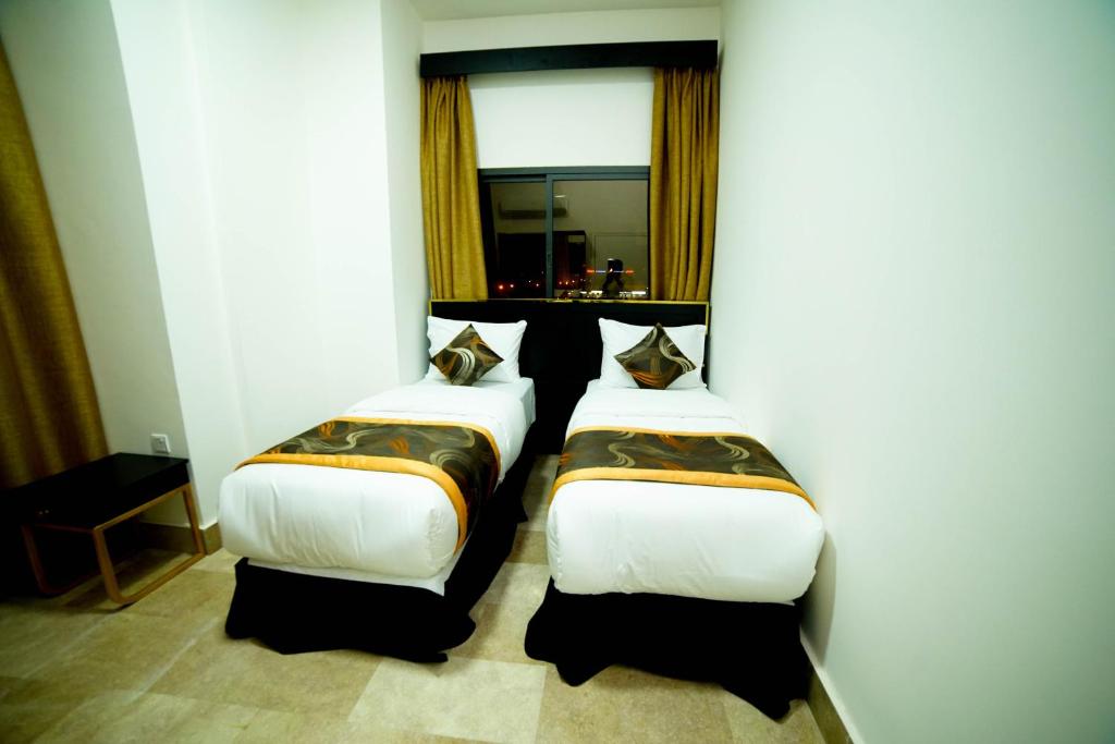 Двухместный (Двухместный номер с 2 отдельными кроватями) отеля OYO 112 Star Emirates Downtown, Салала