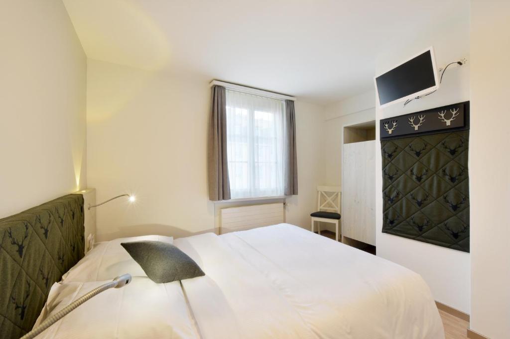 Двухместный (Двухместный номер с небольшой двуспальной кроватью) отеля Hotel Hirschen, Цюрих