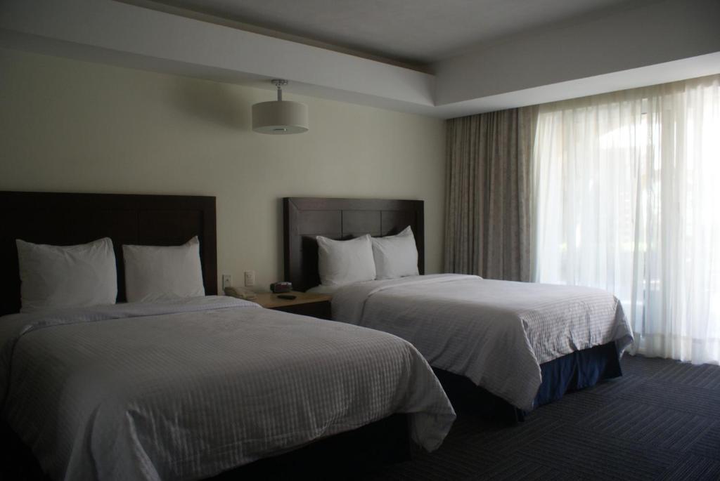 Двухместный (Представительский двухместный номер с 1 кроватью) отеля Camino Real Guanajuato, Гуанахуато