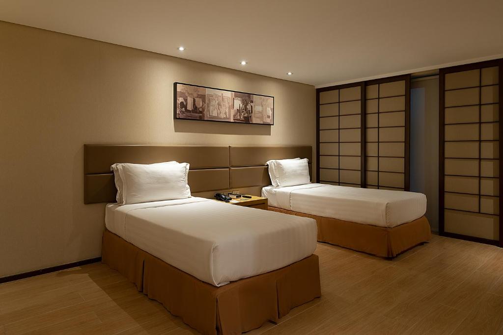 Двухместный (Двухместный номер бизнес-класса с 2 отдельными кроватями) отеля Jinjiang Inn Makati, Манила