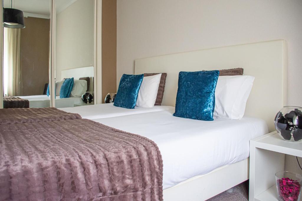 Двухместный (Улучшенный двухместный номер с 2 отдельными кроватями) отеля O'Porto Seven - Guest House, Порту